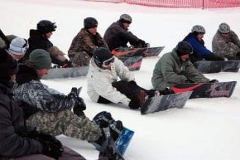 snowboarding lesson at snowy mountain accommodation